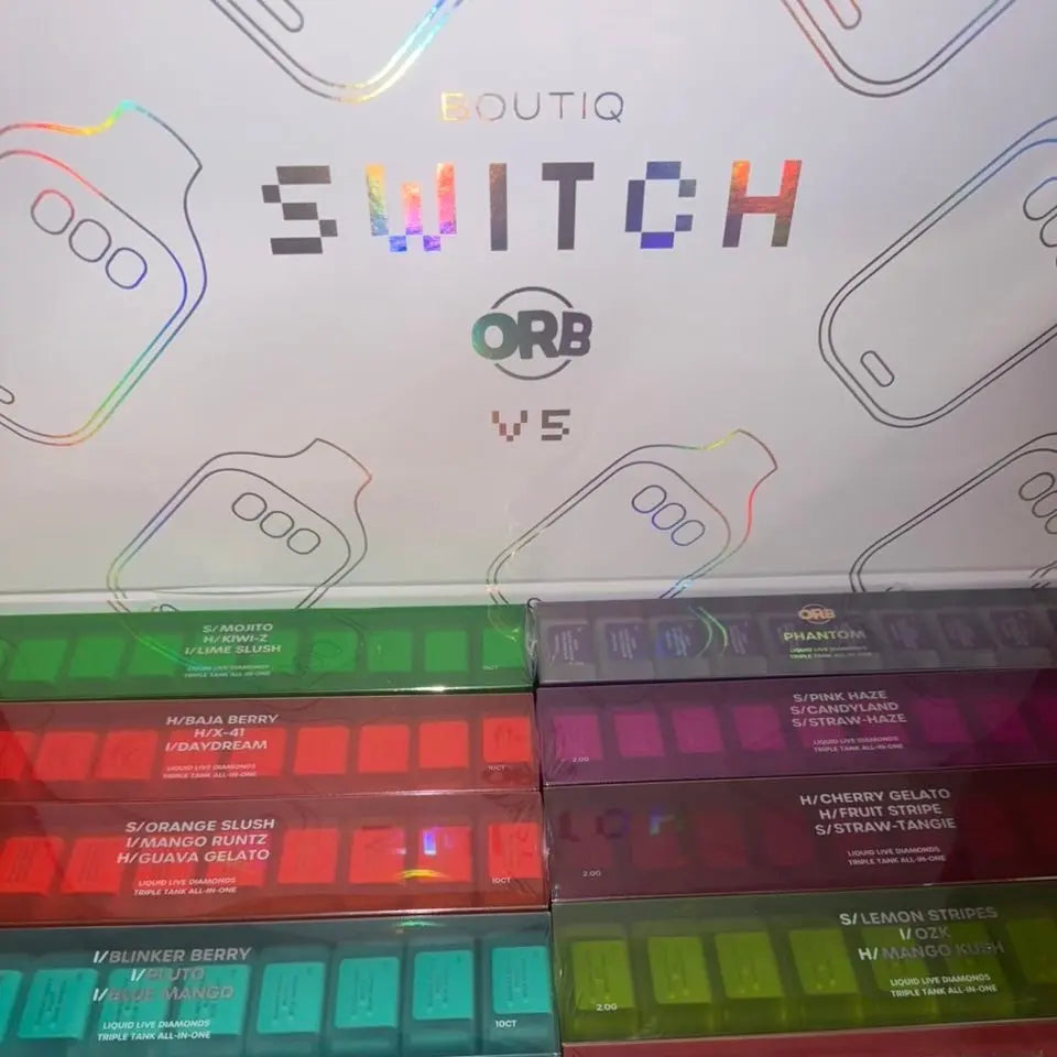 XCLUSIVE BOUTIQ X “ORB” switch with sleek design, featuring black and silver accents, for custom mechanical keyboard setups.